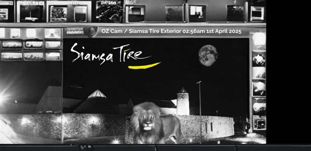 A lion stands before Siamsa Tíre theatre Tralee at night beneath a full moon.