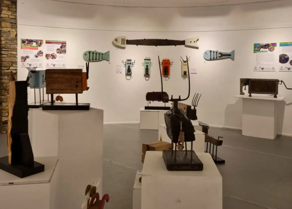 Art gallery at Siamsa Tíre theatre Tralee showcasing whimsical recycled animal sculptures.