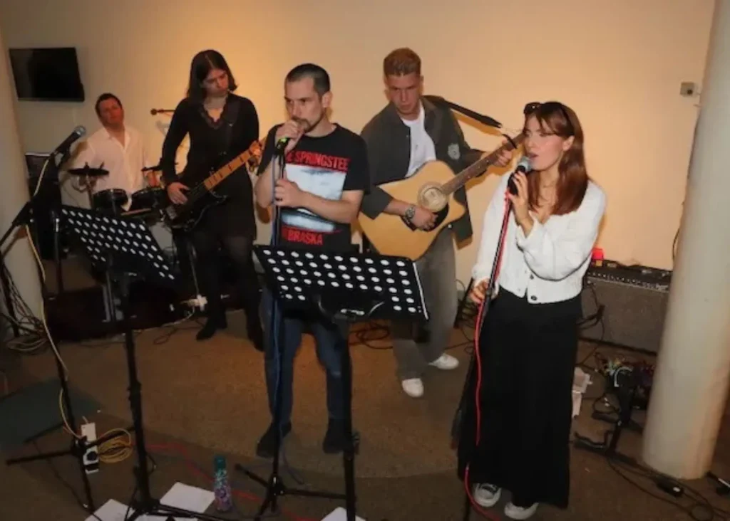 ***Photo of a group of young musicians performing