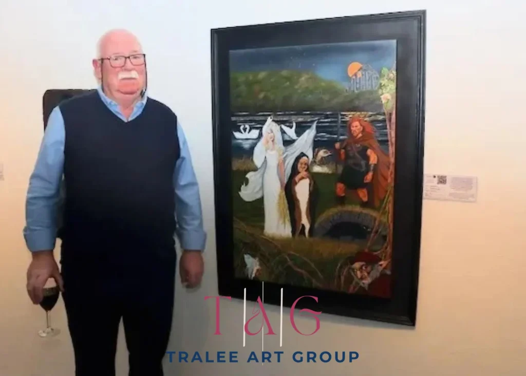 ***Photo of a man standing next to a painting on a wall. Logo Text "Tralee Art Group"